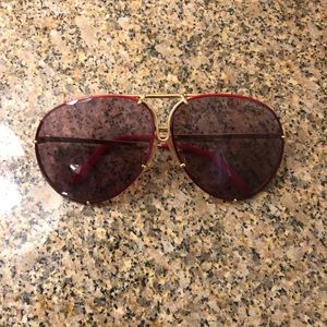 Porsche design sunglasses with red and gold detail